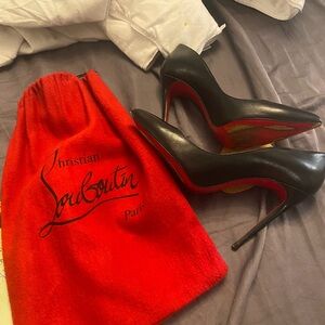 Christian Louboutin Black Heels with Red Sole